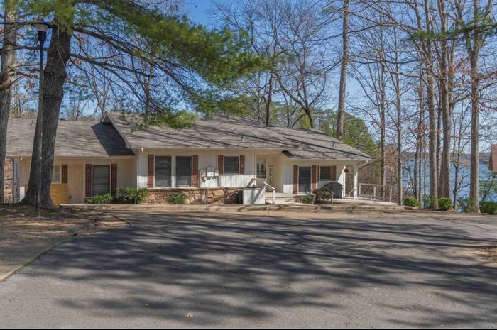 Front exterior and driveway of the Hot Springs Village home