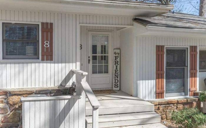 Covered front entry to the lake house