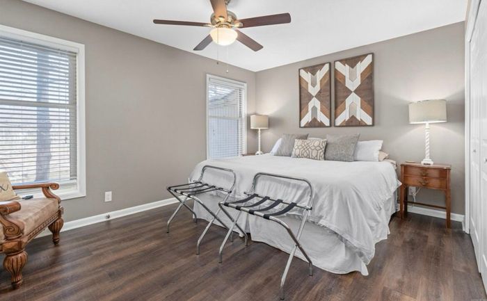 Primary Suite with smart TV and dresser