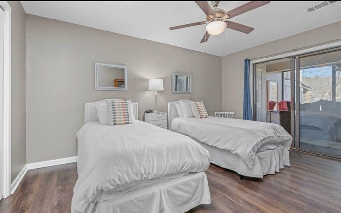 Twin beds with access to lower level sunroom