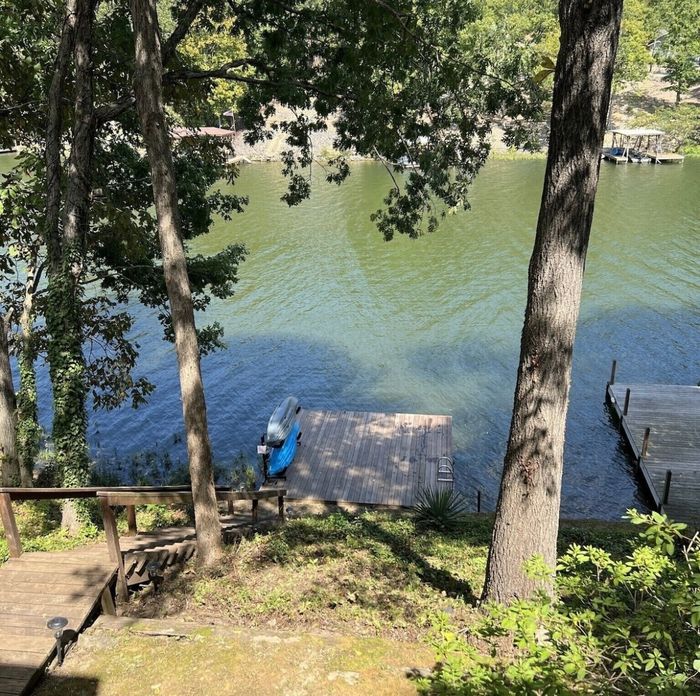 Filtered lake views through the trees from the yard